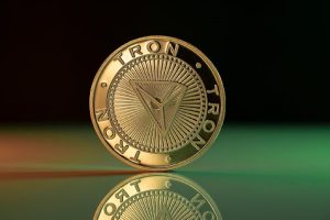 Read more about the article TRON (TRX) on the Brink of All-Time High as Volume Soars 200% in Memecoin Mania