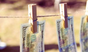 Read more about the article Coinbase Hacker Launders Millions, Mocks Investigators with Meme